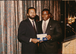 Photograph of Two Unknown Individuals, One Is Receiving an Award by Las Vegas Chapter of the National Bar Association