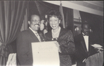 Black and White Photograph of (L-R) Johnnie Cochran and Unknown Individual, One Is Receiving an Award by Las Vegas Chapter of the National Bar Association
