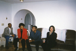 Photograph of a Group of People Sitting at a Potluck/Party by Las Vegas Chapter of the National Bar Association
