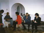 Photograph of a Group of People Sitting at a Potluck/Party by Las Vegas Chapter of the National Bar Association